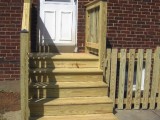 Exterior stairs built from pressure treated lumber leading to the kitchen at home on Seminary Road, Silver Spring, MD.