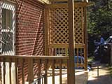 Trellis style porch built for exterior kitchen entrance for home on university Boulevard in Silver Spring, MD.